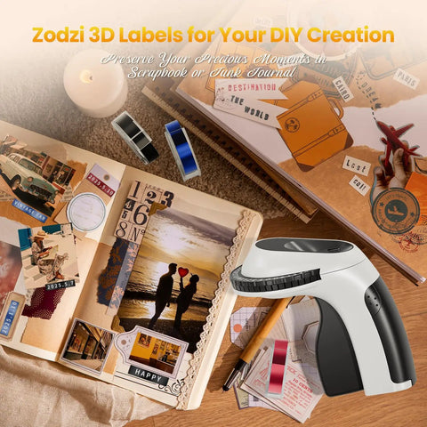 Super Slick Manual 3D Embossing Label Maker With Tape Roll Inkless Quiet Rotation Press Cut Mechanism No Batteries Or Apps Needed Easy Peasy For Home Office School Supplies And Junk Drawers on a scrapbook with colorful tapes.