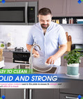 Man cleaning 12.75 Inch Microwave Plate Replacement Fits WB49X10129 WB49X10074 Glass Turntable Plate at kitchen sink