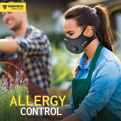 Woman wearing Dust Face Mask With Extra Activated Carbon Filters And Air Valves For Woodworking And Construction Jobsites