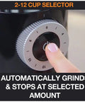 Close-up of dial on Home Barista Ready Burr Coffee Grinder With 12 Grind Settings And 8 Oz Capacity, adjusting grind amount.
