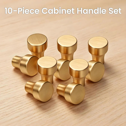 Brushed Gold Round Cabinet Knobs Set Of 10 Zinc Alloy Single Hole Drawer Pulls on a wooden surface