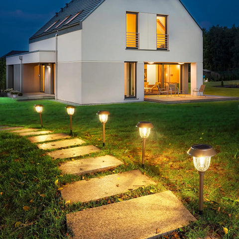 Six Pack Solar Pathway Lights Outdoor 25 Lumens Warm White 3000K IP65 Weatherproof Metal And Glass Landscape Lights illuminating path