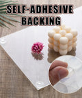 24 Pack Clear Self Adhesive Rubber Feet For Glass Tables And Drawers Rock Solid Anti Slip Bumpers Total Lockdown Grip Zero Drama Slide Super Tight Peel Stick Setup on table with flower and candle.