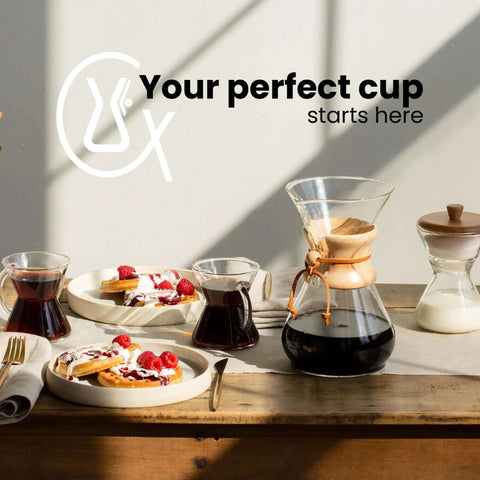 Ottomatic Auto Pour Over Coffee Maker Set With 40 Ounce Capacity, 6 Cup Glass Coffeemaker and breakfast setup on table.