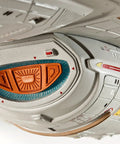 Close-up of U.S.S. Voyager 1:670 Scale Unassembled Unpainted Plastic Model Kit showing detailed surfaces of Intrepid-class hull.