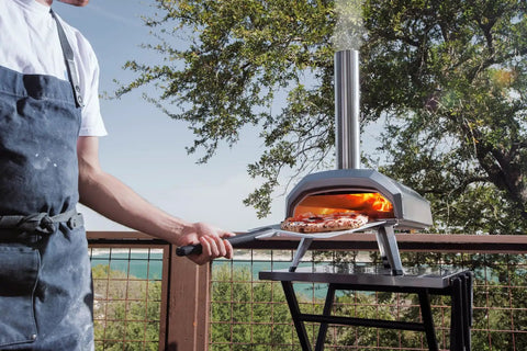 Karu 12 Multi Fuel Outdoor Portable Pizza Oven delivers 950 F heat, cooking 12 inch pizzas in 60 seconds with built-in pizza stone.
