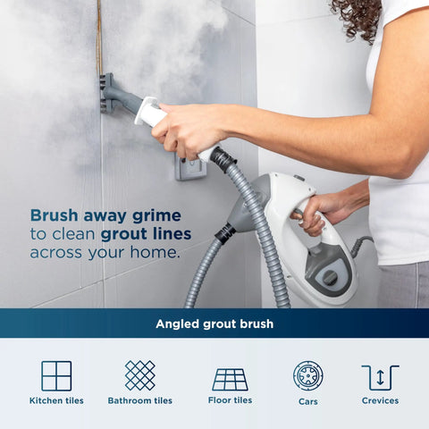 Whole Home Steam Mop With Detachable Handheld For Sealed Floors, cleaning grout lines with steam and angled brush.