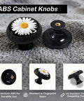 12 Pack White Daisy Cabinet Knobs With Bright Yellow Center On Matte Black Base For Kitchen And Bathroom Drawers on textured surface.