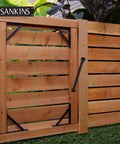 11.5 Inch Gate Spring Self Closing Heavy Duty Built To Last Outdoor Door Spring For Metal Gate Closure With Adjustable Tension For Wooden And Vinyl Fences Black Finish 4 Pack installed on wooden fence gate
