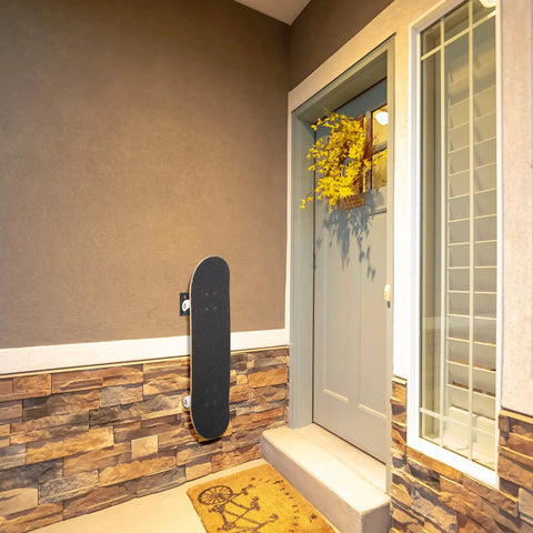 Heavy Duty Steel Skateboard Wall Mount Rack Secures Decks For Garage Storage Rad Display Setup, mounted beside door.