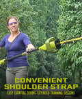 Woman using Multi Angle Telescoping Electric Hedge Trimmer With Convertible Pole To Handheld 19 Inch Blade 4.5 Amp outdoors