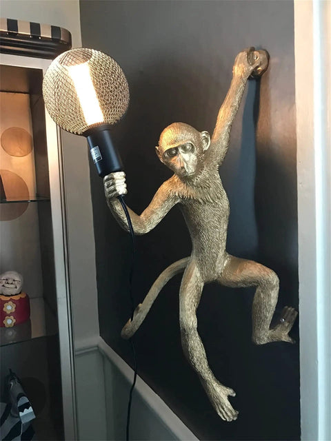 Dope Monkey Wall Light Fixture Industrial Resin Wall Lamp For Living Room And Kids Bedroom Vintage White Right Hand Design Durable Resin Craft Easy Mount Decor For A Cozy Vibe in gold tone, mounted on wall