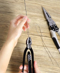 Using 6 Inch Safety Wire Pliers with stainless steel wire on wooden surface for aircraft machinery and vehicles lock wire tasks