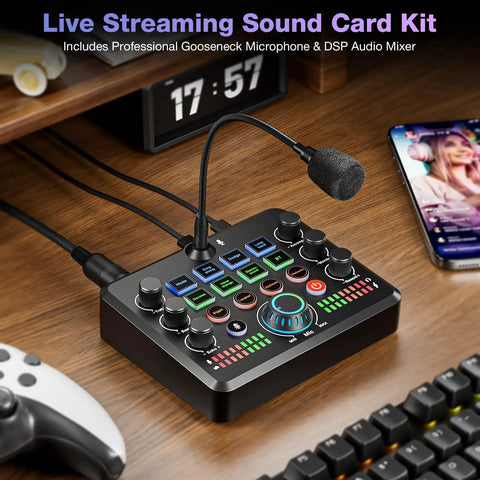 All In One Live Sound Card Mixer With Gooseneck Mic And Voice Changer For Streaming Gaming And Recording On Phone PC And Laptop Bluetooth DSP Reverb Noise Reduction on desk with game controller and smartphone