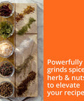 Krups Electric Coffee Grinder With 3 Oz Capacity And 200 Watt Motor grinds spices, herbs, and nuts on a wooden tray.