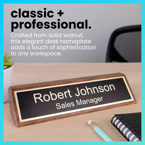 Personalized Walnut Wood Desk Name Plate With Black Base And Gold Lettering, 2 By 8 Inches on desk with chair, pen, and notebook