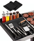 Silicone Grill Mat Two Pack for Blackstone 16x11.5 Inch Non Slip Tool Mats with tools and sauce bottles on Blackstone griddle
