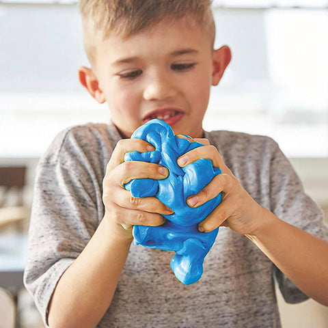 Child playing with blue slime made with Liquid School Glue That Bonds Paper, Wood, Fabric And More, Washable, Safe And Non Toxic.