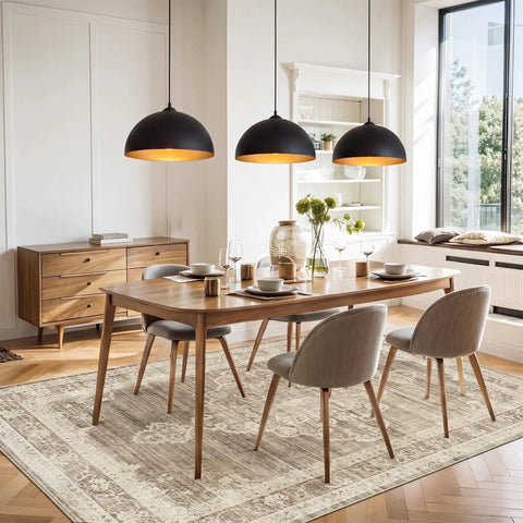 Esfos 11.8" Black and Gold Pendant Lights Kitchen Island, 3 Pack Chandelier hanging above a modern dining table.