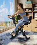Crush Your Cardio Game On This Smooth Five In One Folding Exercise Bike Featuring Sixteen Level Magnetic Resistance And Rock Solid Three Hundred Pound Build, user pedaling indoors.