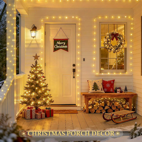 Front porch decorated with Christmas lights and wreath, featuring a lit tree and gifts, showcasing 2 Pack Outdoor Solar String Lights With 33 Feet Copper Wire