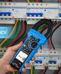 Hand holding Pro Grade Inrush Clamp Meter Multimeter 1000A True RMS 6000 Counts AC DC Current And Voltage Tester in electrical panel