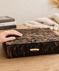 Natural Water Hyacinth Wicker Storage Baskets With Lids Set Of 2 on table, hand touching handwoven rustic organizer bin