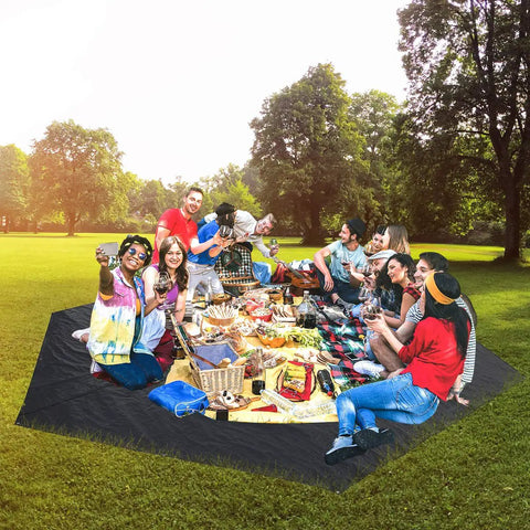 Group enjoying picnic on Heavy Duty Waterproof 10x10 Tarpaulin Ground Cover For Outdoor Camping in park