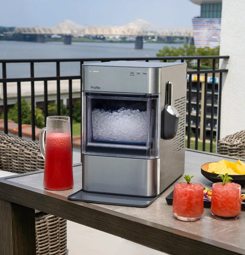 Genuine Game Changing Nugget Ice Maker With Smart Wifi App And Built In Scale Fighting Filter Makes Hella Crisp Chewable Pellet Ice Fast on patio.