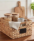 Two Pack Wicker Storage Baskets Rectangular Water Hyacinth Organizer with chalkboard label on kitchen counter