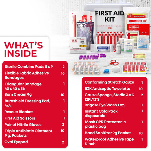 White first aid kit box labeled FIRST AID KIT with assorted bandages and medical supplies around it
