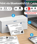 Bluetooth Thermal Shipping Label Printer For Small Biz Wireless 4x6 Label Printer That Works With IPhone Android Windows Great For Amazon eBay Shopify Etsy White next to laptop with printed label