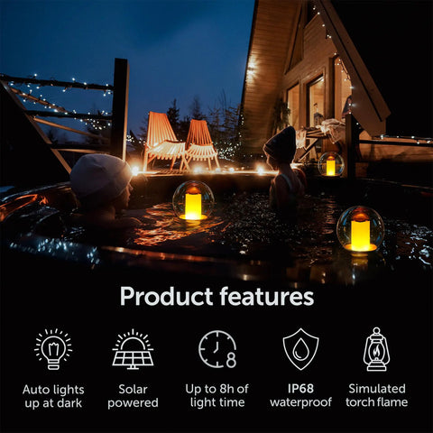 Solar Powered Floating Globes For Pool Pond Patio And Hot Tub Outdoor Lanterns That Look Like Candles Or Torches Perfect Party Decor And Chill Ambience A Fun Gift For Adults And A Must Have Pool Toy glowing in a hot tub at night.
