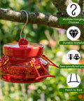 6 Oz Glass Hummingbird Feeders For Outdoors Hanging 2 Pack Mason Jar Style With 4 Realistic Silicone Flower Ports Perches Easy To Clean Refill Red For Gardens And Patios hanging on tree branch