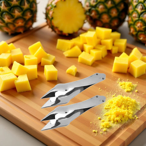 Stainless Steel Pineapple Eye Remover And Core Cutter With V Shaped Tip on cutting board with diced pineapples