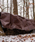Heavy Duty Poly Tarp Cover Built Tough With 16 Mil And 10 Mil Thickness Grommets And Reinforced Edges True To Size 20x20 Ft All Weather Outdoor Tarp In Brown White Silver Black For Rain Wind Snow UV covering logs in forest