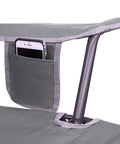 Close-up of Comfort Pro Rocker Outdoor Rocking Chair with built-in beverage holder, showing breathable mesh and nylon frame detail.