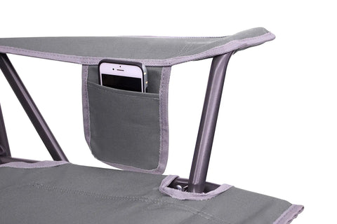 Close-up of Comfort Pro Rocker Outdoor Rocking Chair with built-in beverage holder, showing breathable mesh and nylon frame detail.