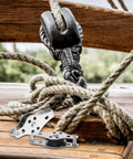 Stainless Steel Pulley Wheels 2 Pack For Kayaks And Canoes, Beefy Heavy Duty Marine Deck Hardware shown with ropes on wooden deck
