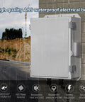 Heavy Duty ABS Electrical Enclosure Box 18.3 X 12.7 X 6.5 Inch weatherproof housing mounted on a wall in rainy conditions.