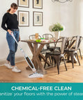 Woman using Straight Up Heavy Steam Mop for Sanitizing Sealed Hardwood Tile and Vinyl Floors with Chemical Free deep cleaning power.