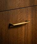 Antique Brass Zinc Alloy Cabinet Pulls With Three And Three Quarter Inch Hole Centers Vintage Style Drawer Handles installed on wood