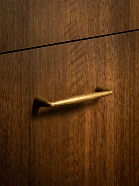 Antique Brass Zinc Alloy Cabinet Pulls With Three And Three Quarter Inch Hole Centers Vintage Style Drawer Handles installed on wood