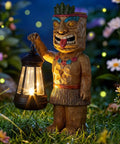 Solar Tiki Statue With Lantern For Outdoor Decor 9.84 Inch Tall Hand Painted Resin Tiki Figurine in garden with glowing lantern