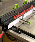 Slick And Kickass 24 Inch Table Saw Fence Extension with Triple T Track Rails, showcasing precision clamps and sturdy design.