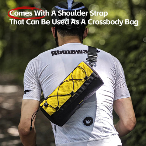 Person wearing 2.8L Waterproof Front Tube Bag For Road Gravel And Mountain Bikes, Cylindrical EVA Frame Pack With Shoulder Strap