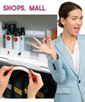 Person showing 60 Pack Magnetic C Channel Label Holders For Metal Racks And Shelves, 3x1 Inches, installation in retail setting