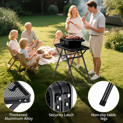 Family using Foldable Grill Table For Camping And BBQ, Heavy Duty 180 Lb Capacity, Two Height Settings Up To 28 Inches, Black outdoors.