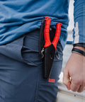 8.5 Inch Stainless Steel Pliers With Non Slip Handle, Spring Loaded, in sheath attached to person's side