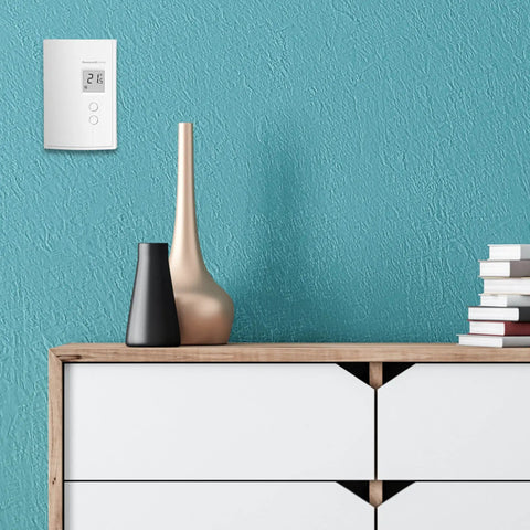 Digital Non Programmable Thermostat For Electric Baseboard Heaters And Convectors With No Frills Silent TRIAC Switching mounted on wall